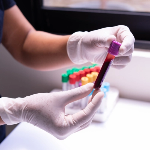Professional phlebotomist providing gentle care